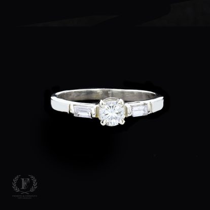 BAGUETTE ACCENTED DIAMOND ENGAGEMENT RING