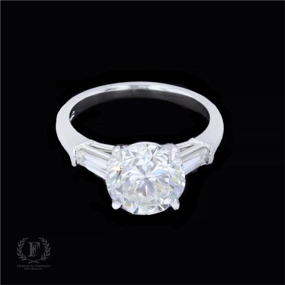 PLATINUM THREE-STONE DIAMOND ENGAGEMENT RING