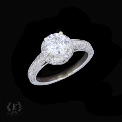 ANTIQUE DIAMOND HALO ENGAGEMENT RING