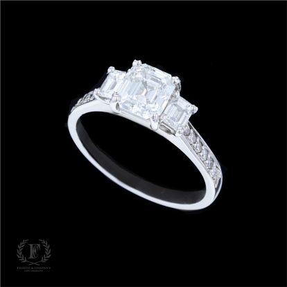 ANTIQUE THREE STONE PLATINUM DIAMOND ENGAGEMENT RING