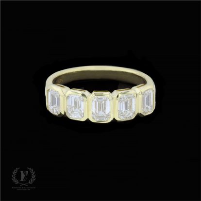 FIVE-STONE EMERALD CUT DIAMOND BAND