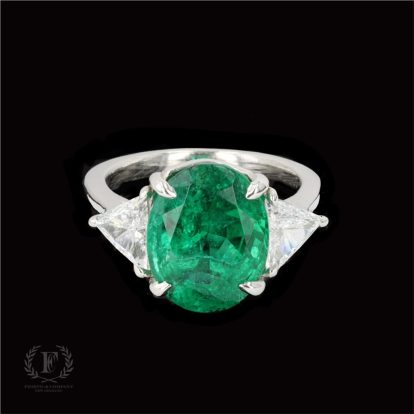 OVAL EMERALD & TRILLION CUT DIAMOND ESTATE RING